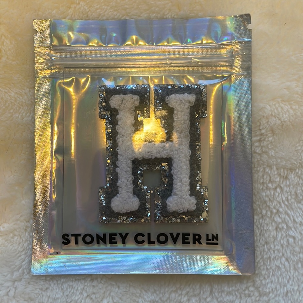 Stoney Clover white with silver sparkle “H” patch